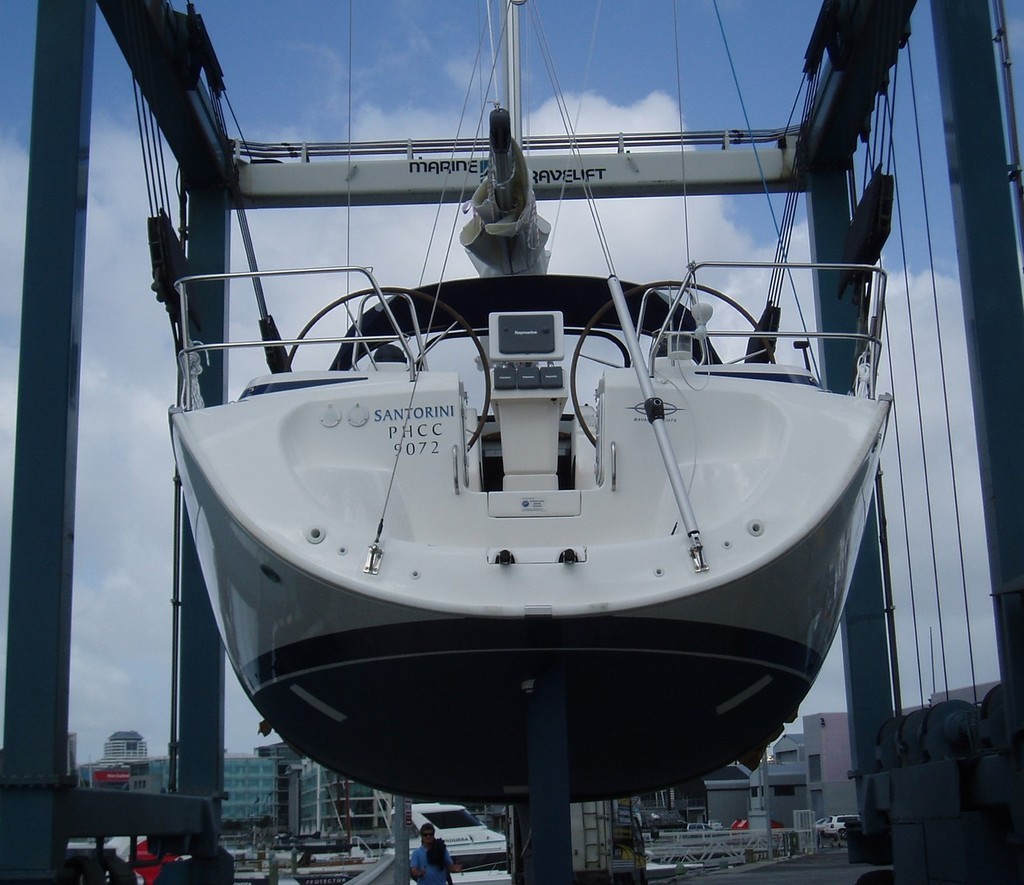 Santorini is hoisted along by the travel lift before her launch - Santorini - 16th Bavaria 42 Cruiser launched in NZ © Jane Pares - IMB